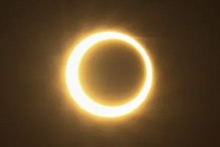 Annular solar eclipse showing a bright ring of the Sun around the Moon